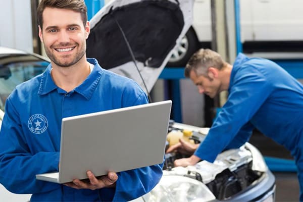 Auto mechanics using computer-aided tools for accurate diagnostics